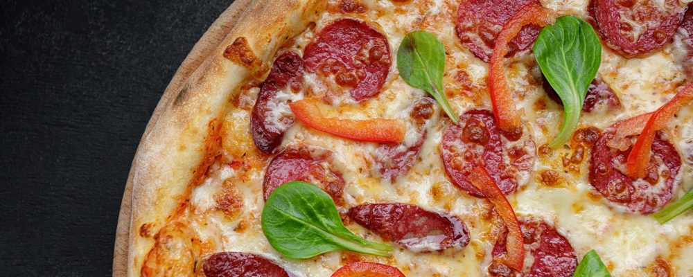 pizza-with-sausage-bell-pepper-closeup-studio-light pizza-with-sausage-bell-pepper-closeup-studio-light